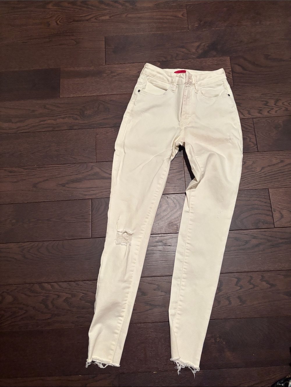 Jennifer Lopez Cream Skinny Jeans with Distressed Knee